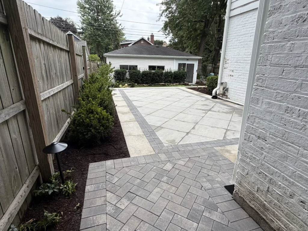Paver patio and walkway in a side yard